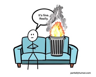 person sitting on couch with bigger trash can filled with fire saying "it's fine, really"