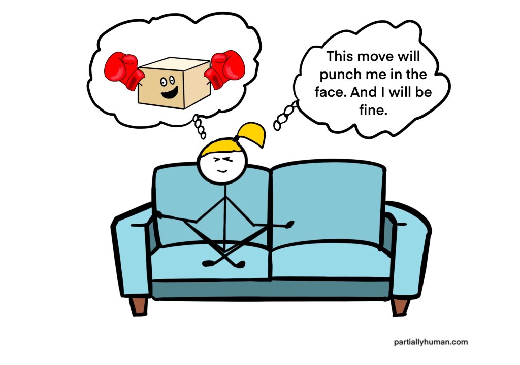 girl meditating on couch, imagining moving box wearing boxing gloves